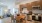 kitchen with stainless steel appliances and a table with chairs
